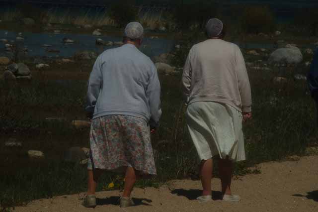 Tourists visit the Old Mission Lighthouse grounds